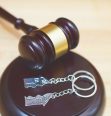 Judge gavel with split home key chain representing Property Division Lawyer New Franklin that can handle your division of property in divorce case.